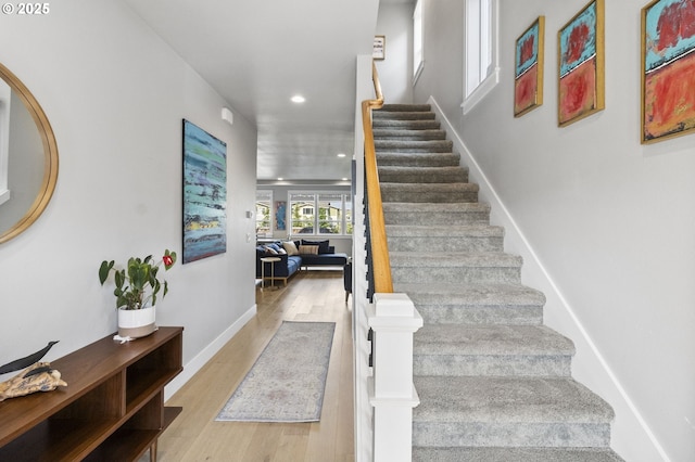 3588 Nestucca Loop, Eugene, OR 97408 - staircase with wood finished floors and recessed lighting
