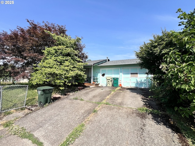 4270 SW 177th Ave, Beaverton, OR 97078 - view of property exterior featuring driveway, a garage, and roof with shingles