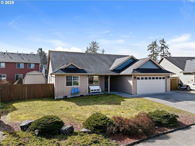 view of front of home featuring a garage, a front yard, concrete driveway, and fence