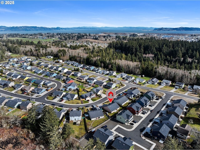 bird's eye view featuring a residential view and a mountain view