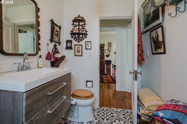 2112 Salem Ave, Albany, OR 97321 - bathroom with vanity, toilet, and wood finished floors