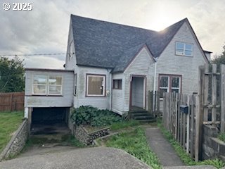 view of front of home with fence