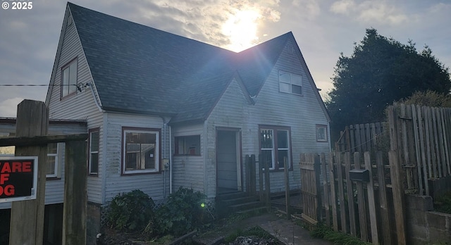 view of front of home with fence