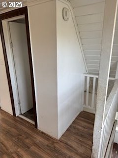 hall featuring dark wood-style flooring