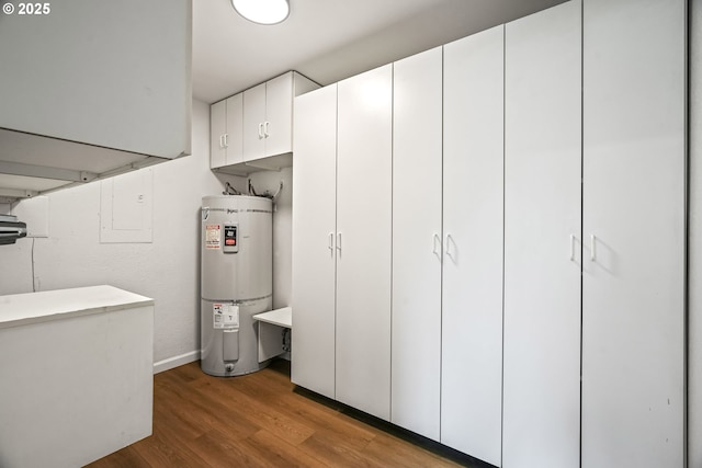 570 N Hayden Bay Dr, Portland, OR 97217 - interior space with water heater and wood finished floors
