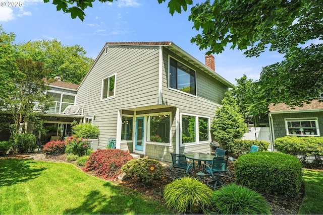 570 N Hayden Bay Dr, Portland, OR 97217 - view of side of home featuring a chimney