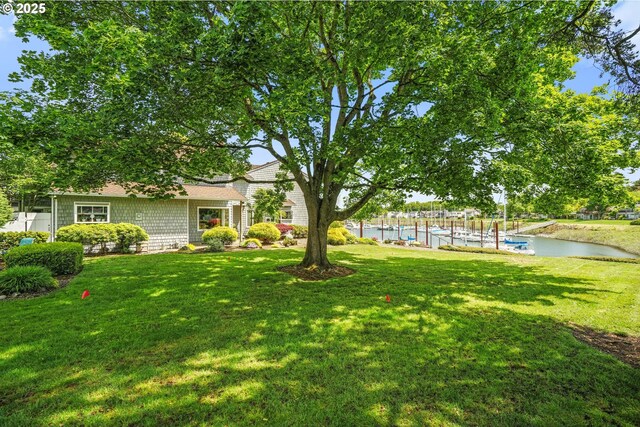 570 N Hayden Bay Dr, Portland, OR 97217 - view of grassy yard with a water view