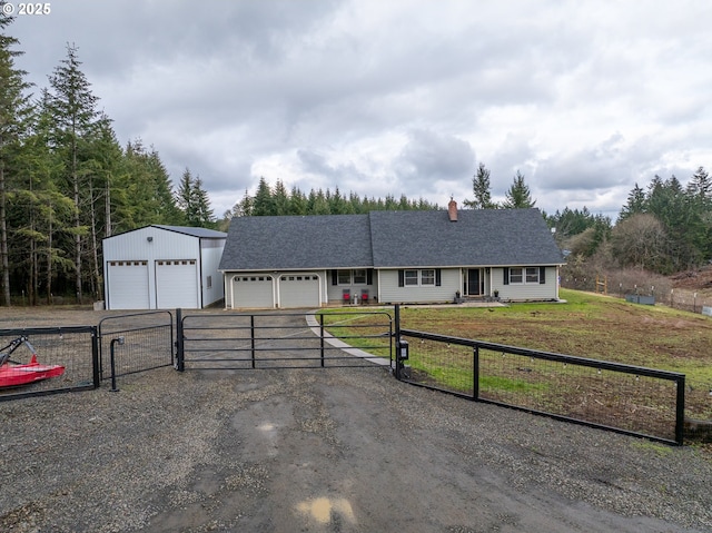 ranch-style home featuring a front yard, a gate, fence, and a chimney