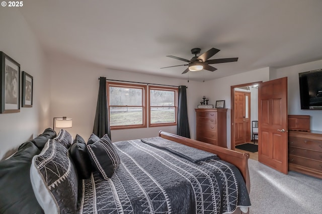 bedroom featuring ceiling fan and carpet floors