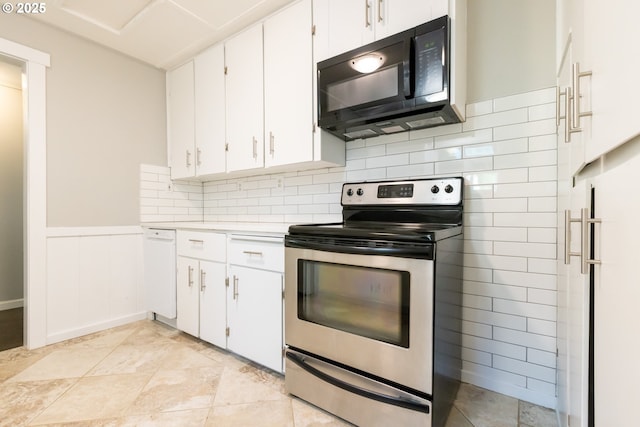 207 N Maple St, Bingen, WA 98605 - kitchen with stainless steel range with electric cooktop, black microwave, dishwasher, light countertops, and white cabinetry
