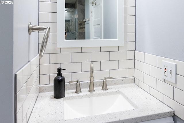 207 N Maple St, Bingen, WA 98605 - bathroom featuring vanity and tasteful backsplash