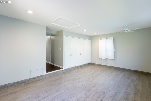 207 N Maple St, Bingen, WA 98605 - unfurnished bedroom featuring recessed lighting, wood finished floors, attic access, and a closet