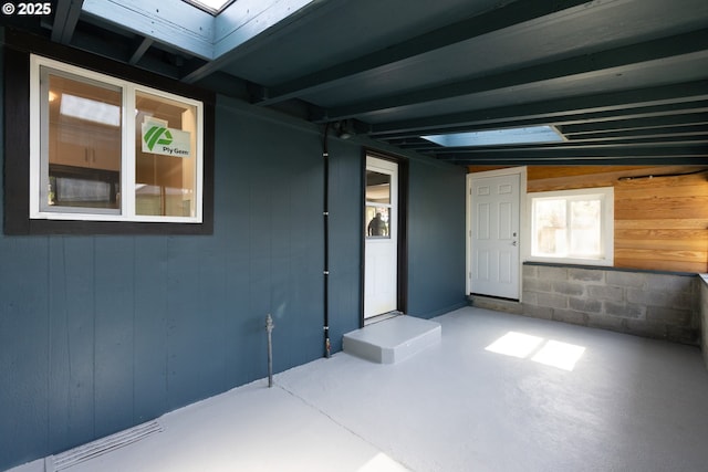 207 N Maple St, Bingen, WA 98605 - interior space featuring concrete floors and wooden walls