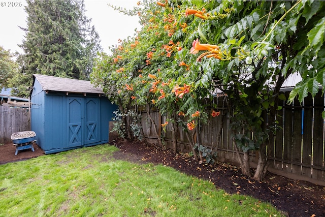 207 N Maple St, Bingen, WA 98605 - view of yard with an outbuilding, a fenced backyard, and a shed