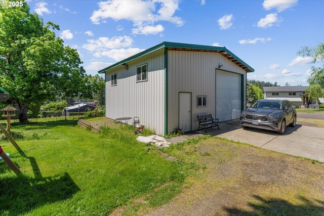 22165 SE Mark Rd, Damascus, OR 97089 - view of outdoor structure featuring concrete driveway