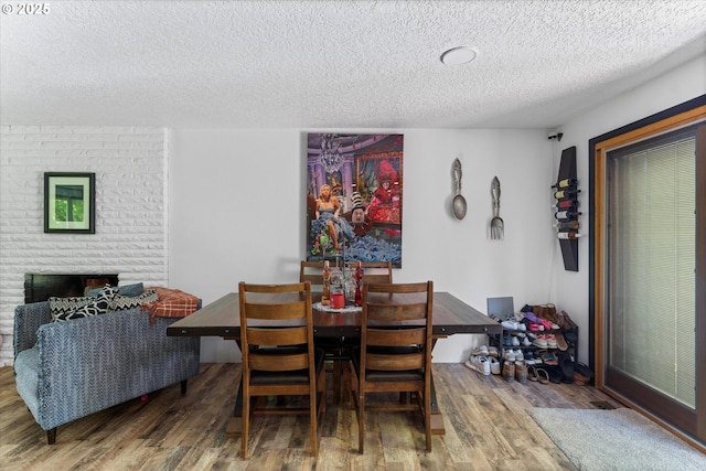22165 SE Mark Rd, Damascus, OR 97089 - dining room with a textured ceiling and wood finished floors