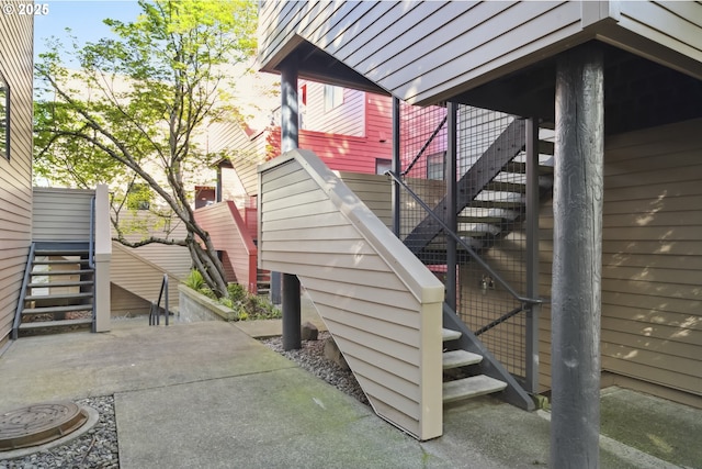 view of home's exterior with stairs