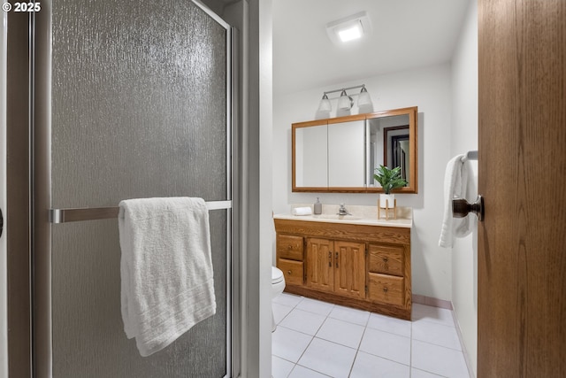 19065 Trillium Dr, West Linn, OR 97068 - bathroom featuring tile patterned flooring, vanity, a stall shower, and toilet