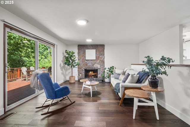 19065 Trillium Dr, West Linn, OR 97068 - living room featuring baseboards, wood finished floors, and a fireplace