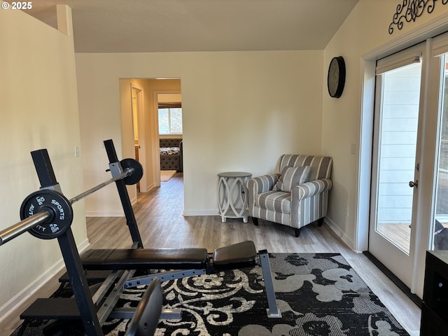 6759 Jasmine Ct, Brookings, OR 97415 - workout room featuring baseboards and wood finished floors
