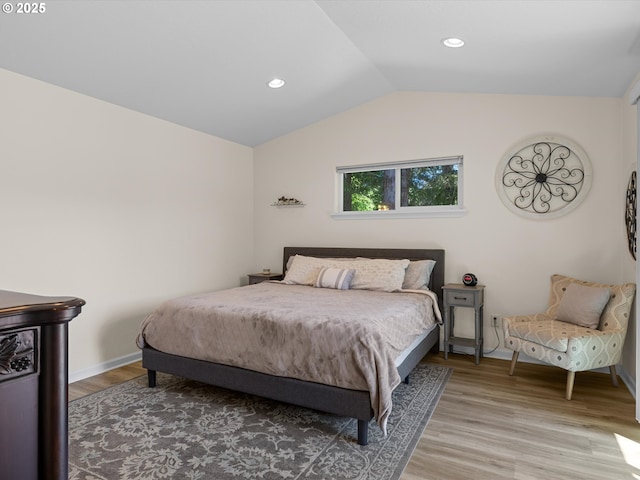 6759 Jasmine Ct, Brookings, OR 97415 - bedroom featuring baseboards, light wood-style floors, recessed lighting, and vaulted ceiling