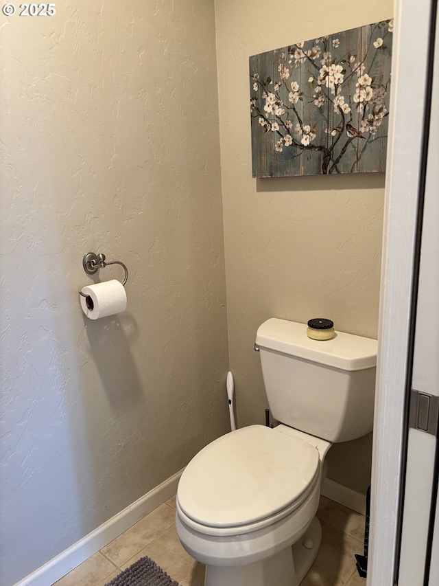 6759 Jasmine Ct, Brookings, OR 97415 - bathroom featuring toilet, baseboards, and tile patterned floors