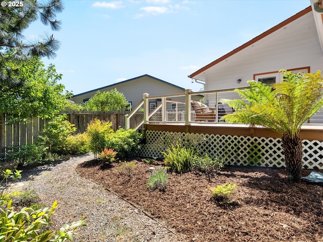 6759 Jasmine Ct, Brookings, OR 97415 - view of yard with fence and a wooden deck
