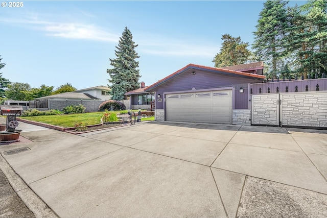 14428 NE Failing St, Portland, OR 97230 - ranch-style home featuring stone siding, driveway, and an attached garage
