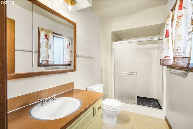 14428 NE Failing St, Portland, OR 97230 - bathroom featuring a shower stall, vanity, and tile patterned flooring