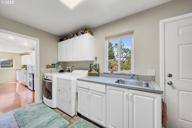 107 4th St, Garibaldi, OR 97118 - washroom featuring independent washer and dryer and cabinet space