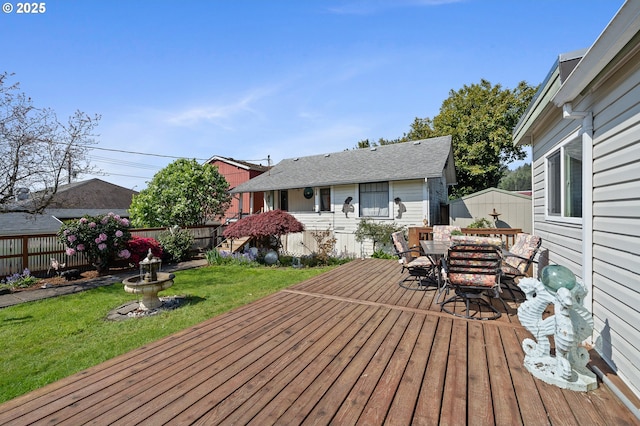 107 4th St, Garibaldi, OR 97118 - wooden terrace with outdoor dining space