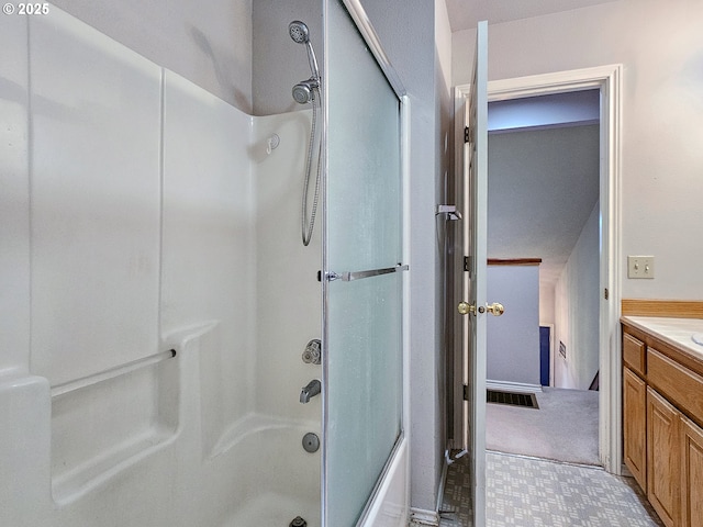 bathroom with  shower combination, visible vents, vanity, and tile patterned floors