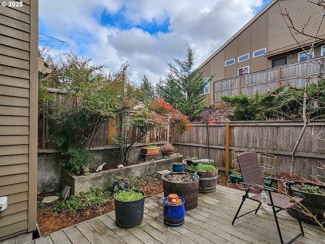 wooden deck featuring fence