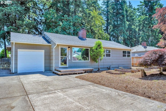513 SE 103rd Ave, Vancouver, WA 98664 - single story home with driveway, a garage, a chimney, and a shingled roof