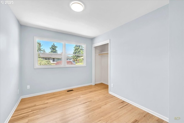 513 SE 103rd Ave, Vancouver, WA 98664 - unfurnished bedroom featuring light wood finished floors, baseboards, and a closet