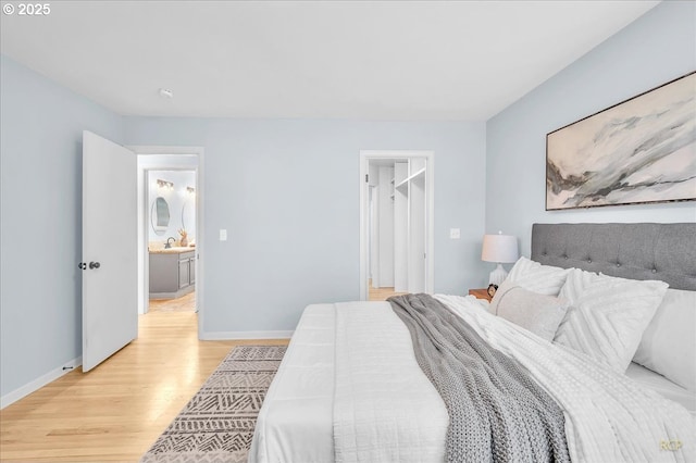 513 SE 103rd Ave, Vancouver, WA 98664 - bedroom featuring light wood finished floors and baseboards
