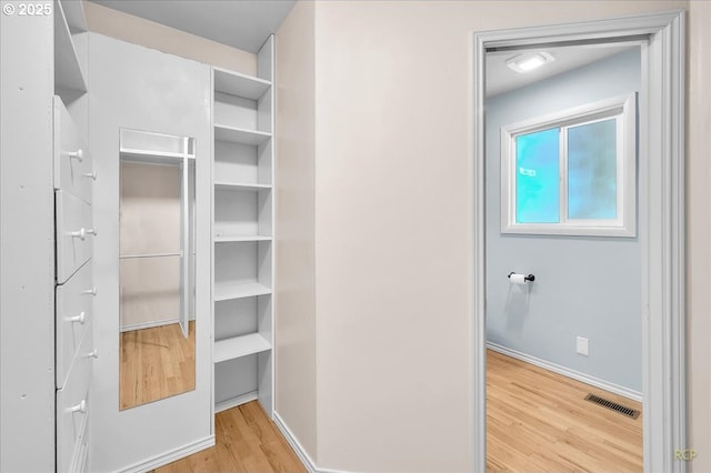 513 SE 103rd Ave, Vancouver, WA 98664 - walk in closet featuring wood finished floors