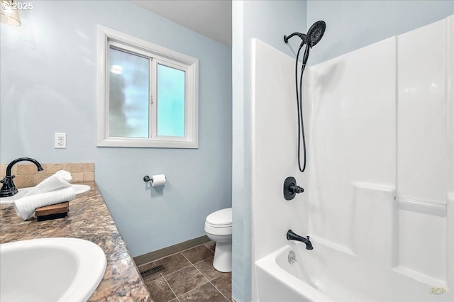 513 SE 103rd Ave, Vancouver, WA 98664 - full bathroom with toilet, baseboards, bathing tub / shower combination, and double vanity