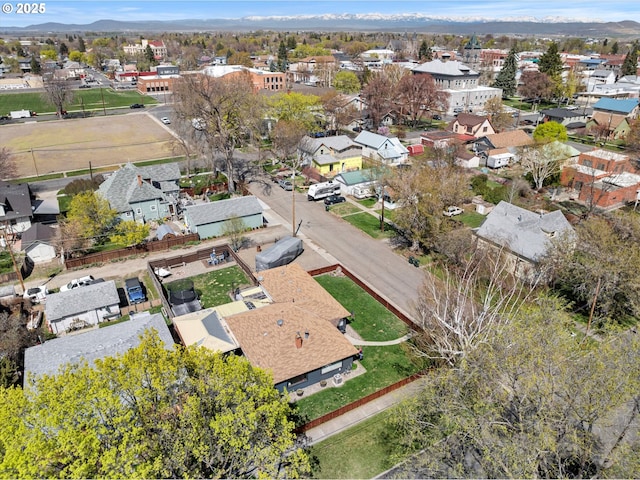 birds eye view of property with a residential view