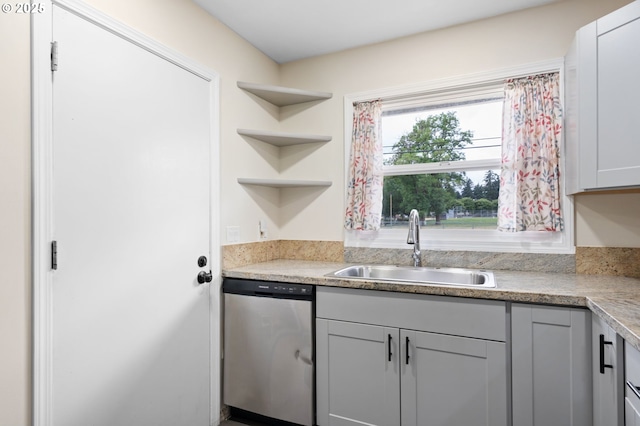 4220 SE 130th Ave, Portland, OR 97236 - kitchen featuring stainless steel dishwasher, open shelves, and light countertops