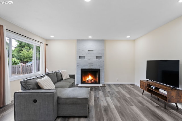 4220 SE 130th Ave, Portland, OR 97236 - living room with recessed lighting, a fireplace, and wood finished floors