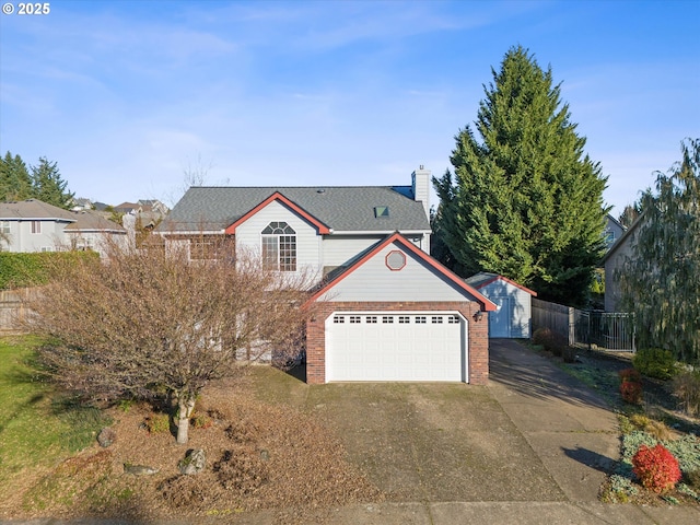 view of front of house with a shed and a garage