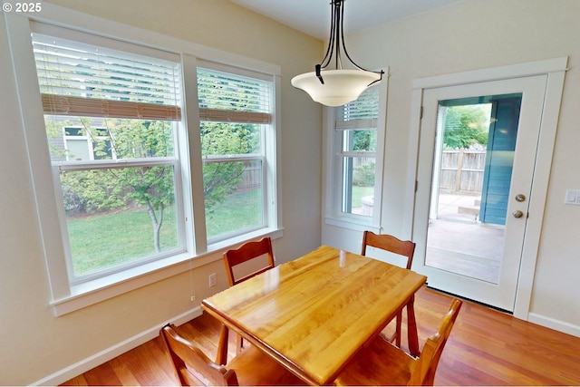 419 Salty Way, Eugene, OR 97404 - dining area with plenty of natural light, light wood-style flooring, and baseboards