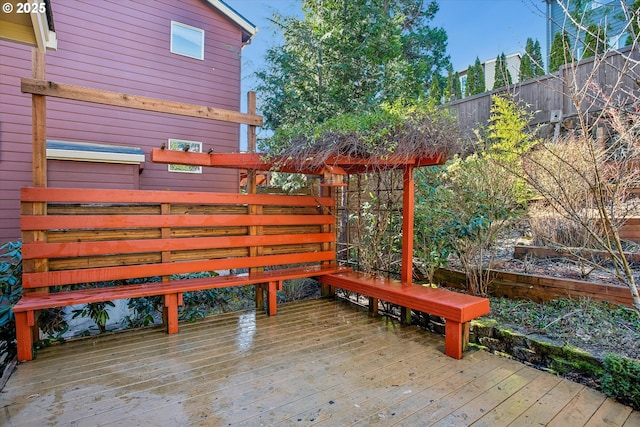 wooden deck featuring fence