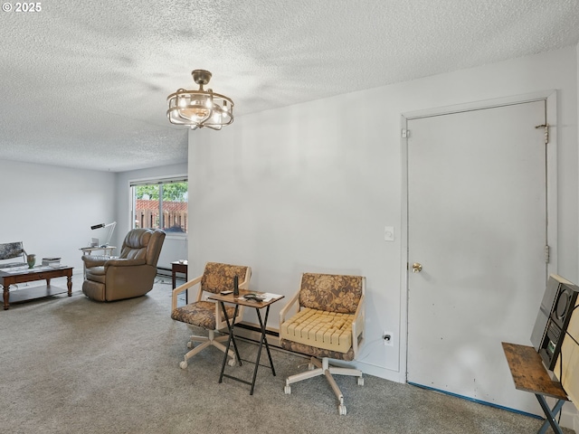 6103 SE 83rd Ave, Portland, OR 97266 - sitting room with a textured ceiling, carpet, and a chandelier