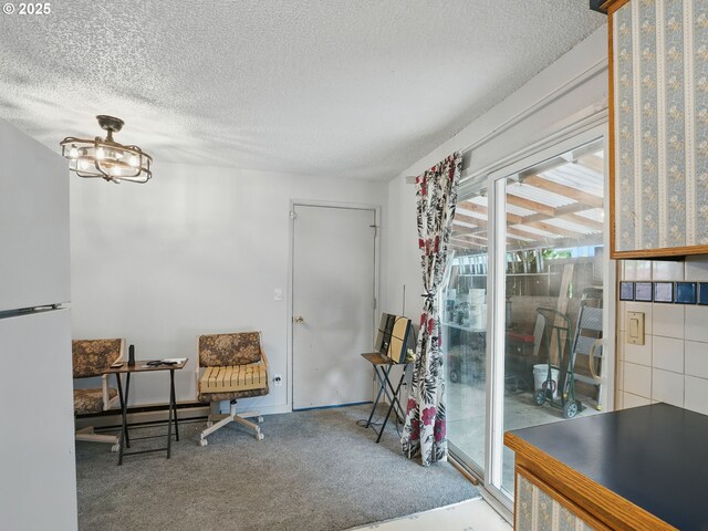 6103 SE 83rd Ave, Portland, OR 97266 - sitting room featuring a textured ceiling and carpet flooring
