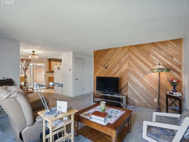 6103 SE 83rd Ave, Portland, OR 97266 - living room featuring wooden walls, carpet, a textured ceiling, and a chandelier
