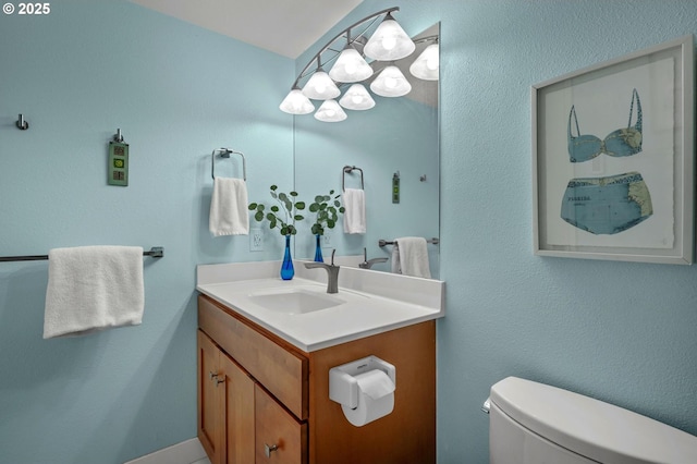 2393 SW Park Pl Unit 113, Portland, OR 97205 - bathroom with vanity and toilet
