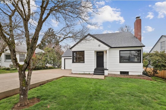 view of front of home with a shingled roof, a front lawn, fence, entry steps, and concrete driveway