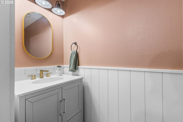 6696 Doral Dr SE, Salem, OR 97306 - bathroom featuring wainscoting and vanity